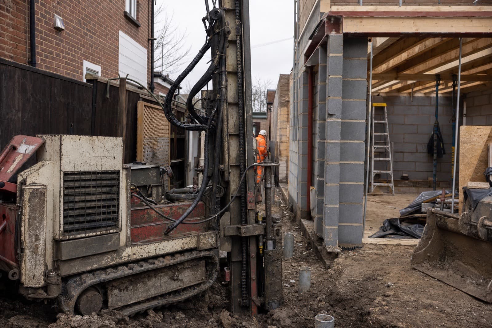 Foundation and enabling works on an active construction plot