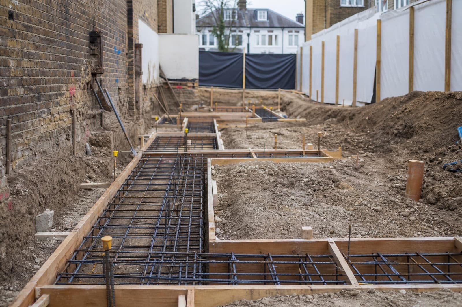 Foundation reinforcement and excavation package on a tight Fulham rebuild plot